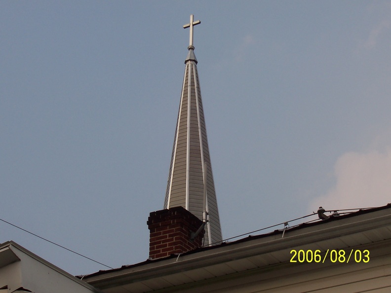 The antenna on my roof is dwarfed by The Cross.jpg